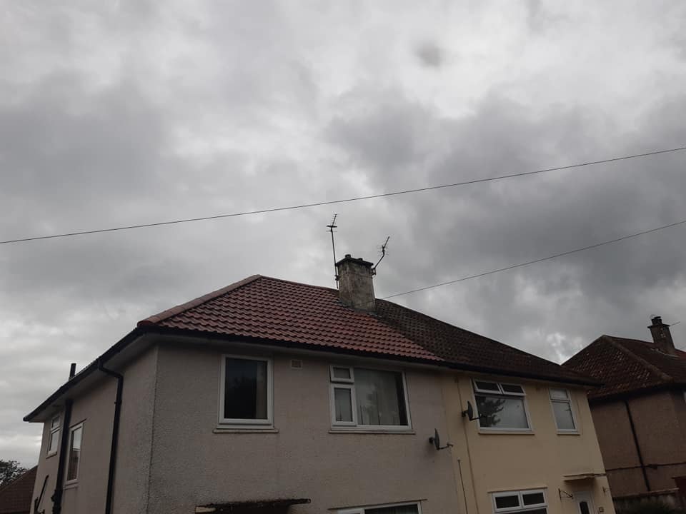 Completed tiled roof on semi-detached house
