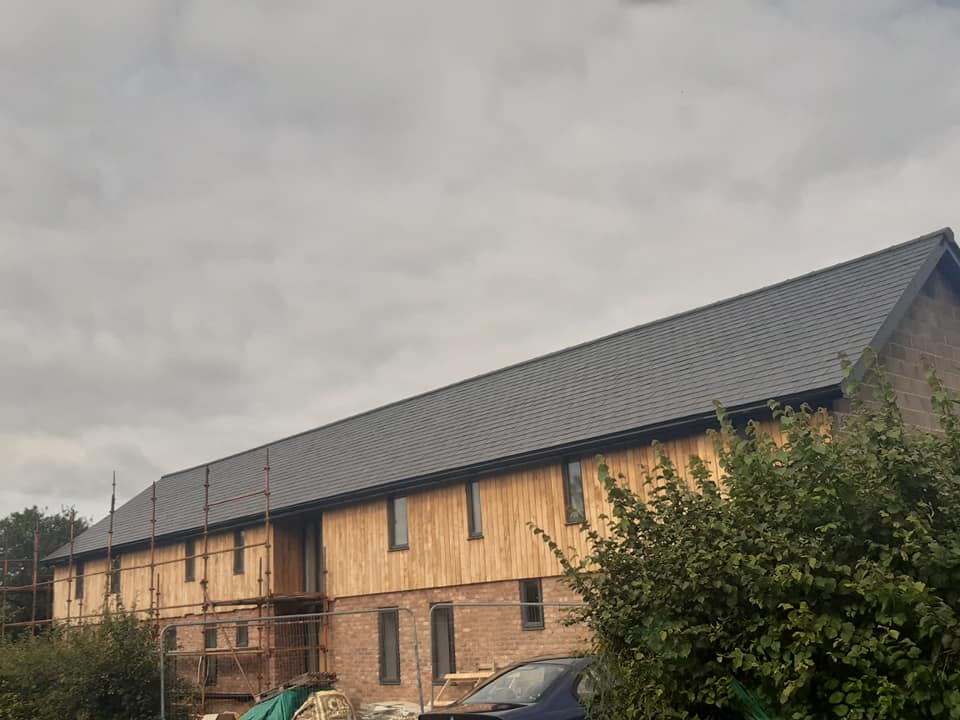 After: new slate roof installed by E J Roofing & Construction LTD
